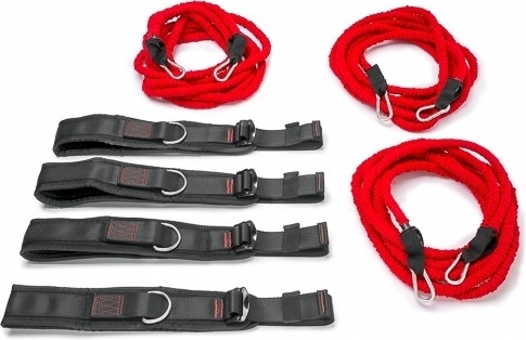 Ein Set aus roten Fitness-Widerstandsbändern mit schwarzen Griffen und Schlaufen, ideal für Krafttraining und Heimfitness.